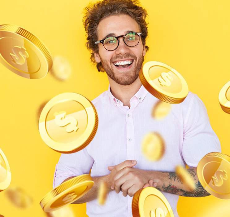 online baccarat winner smiling, holding his hands while coins flying around